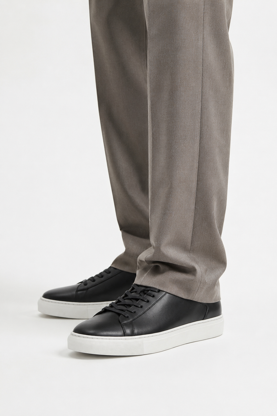 Low-top leather sneaker · Black — View 4